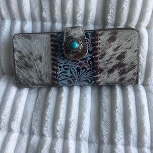 Stylish Leather and Hair Wallet a Print Accent